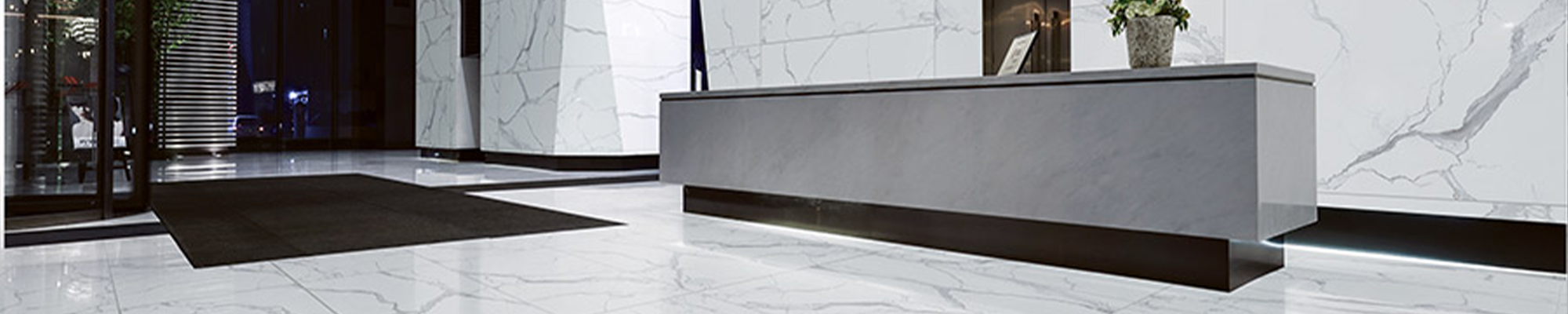 entrance to office building with tile floors and walls