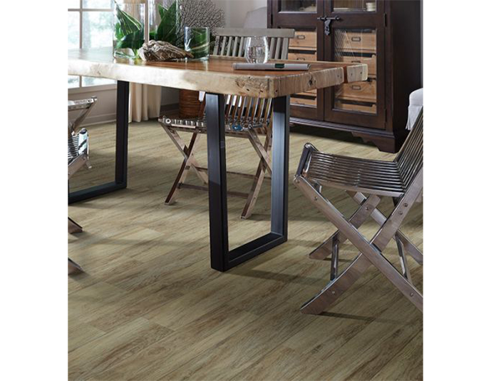 wooden dining table with chairs on luxury vinyl floor