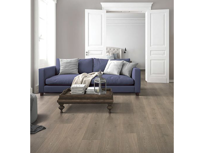blue sofa and coffee table on laminate floor